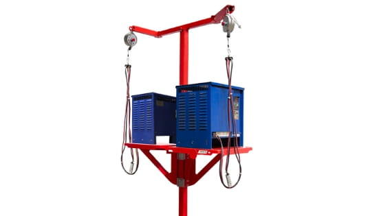 BHS battery charger stand with integrated cable management in a warehouse charging area.