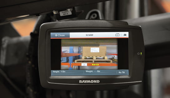Monitor displaying a forklift backup camera system view for enhanced operator visibility