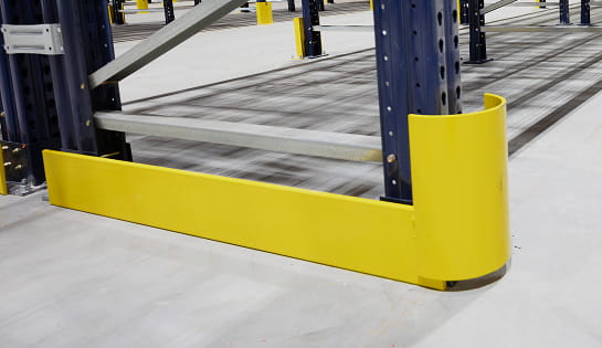 Save-ty Yellow Products end racking protection installed on a rack upright in a warehouse