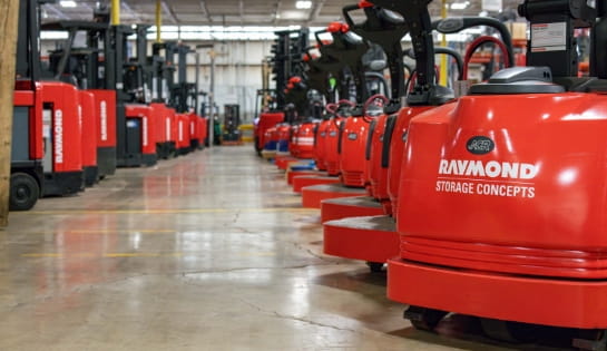 Rows of Raymond counterbalance forklifts and rider walkies ready for short-term rental at the Raymond Storage Concepts Columbus branch
