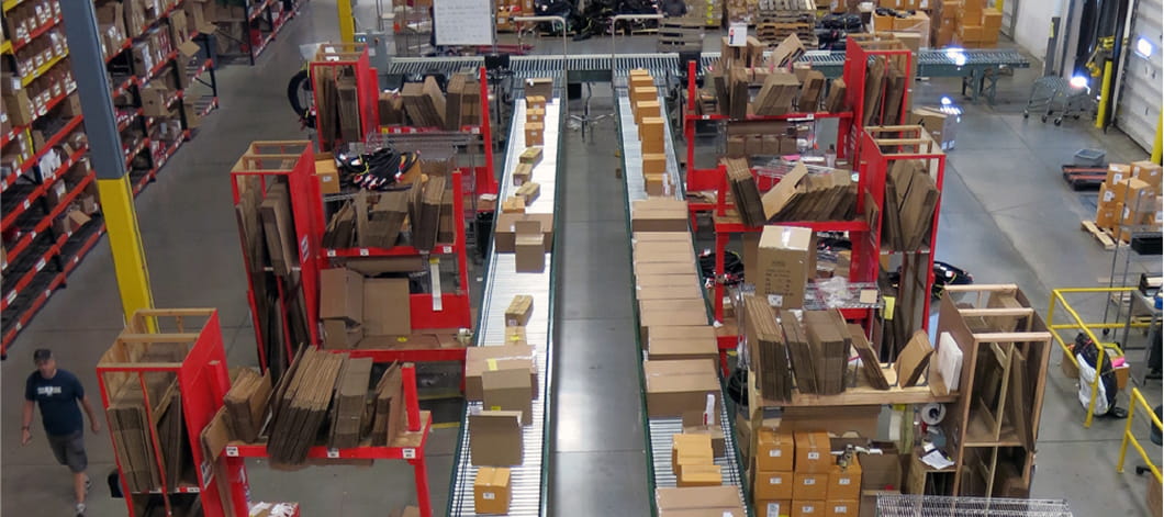 Parallel running conveyors in the shipping and packing warehouse area at Specialized Bicycle Components