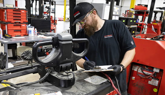 RSC technician inspected a used Raymond forklift getting it ready for a customer.